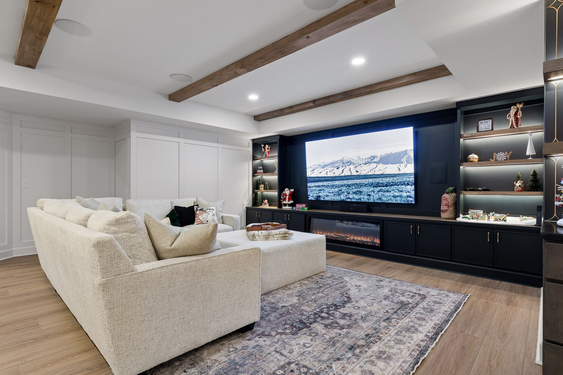 128 Olde Heritage entertainment room with built-in wall and fireplace