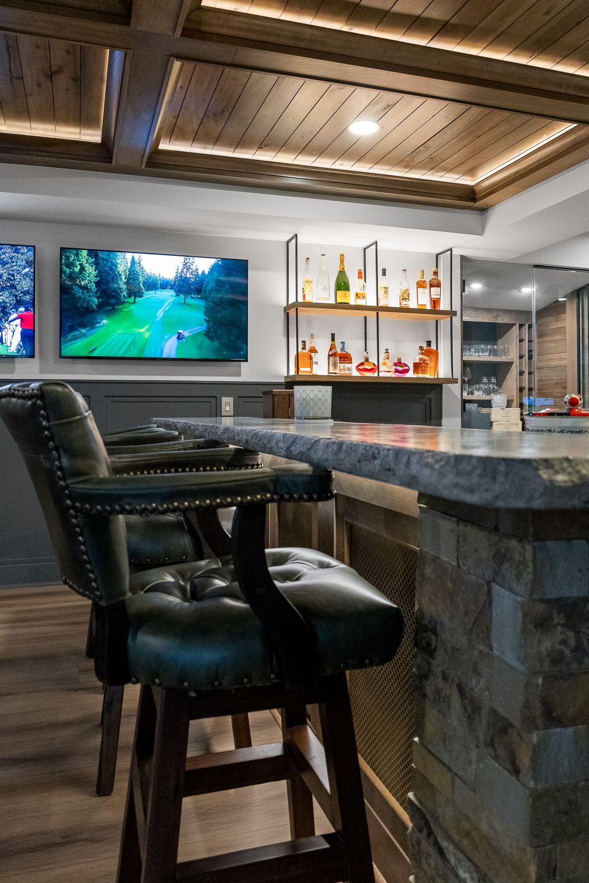 Golf lounge bar stone base coffered ceiling basement