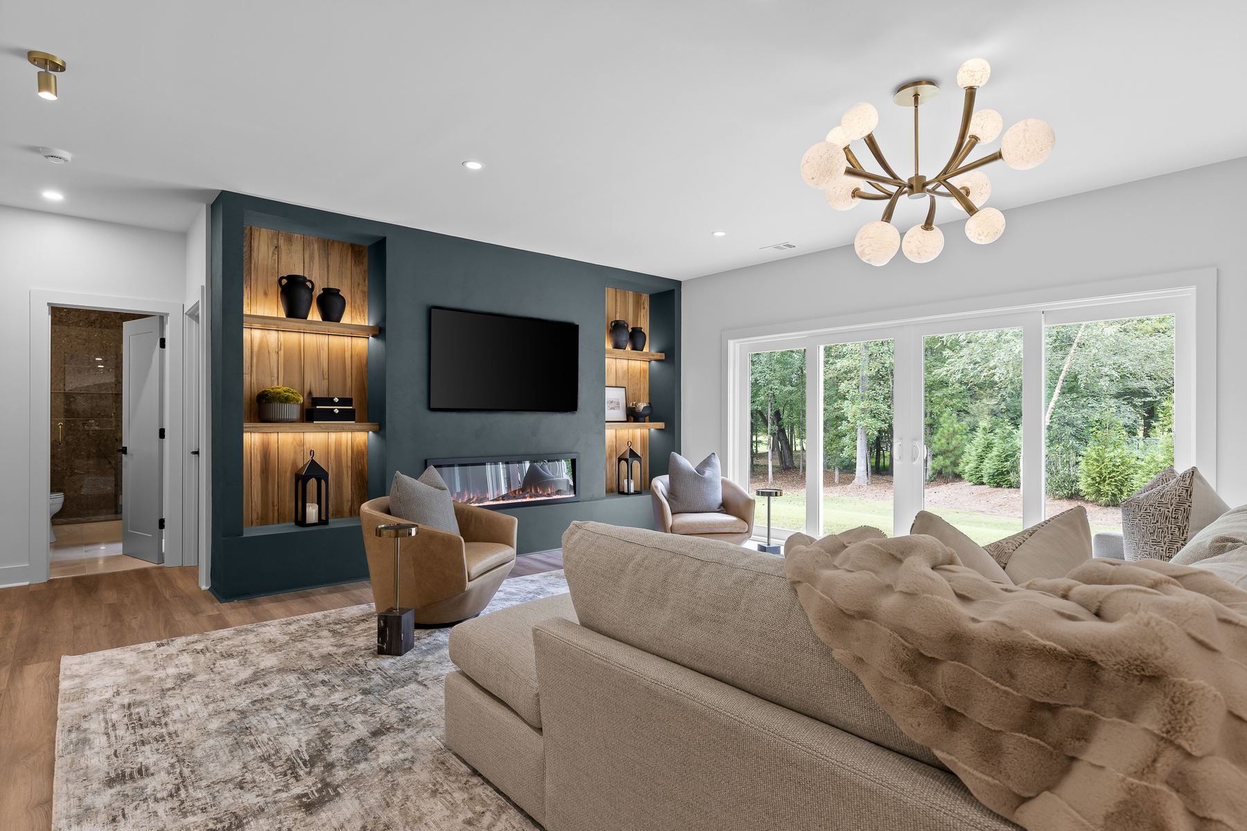 Teal built-in entertainment wall linear fireplace