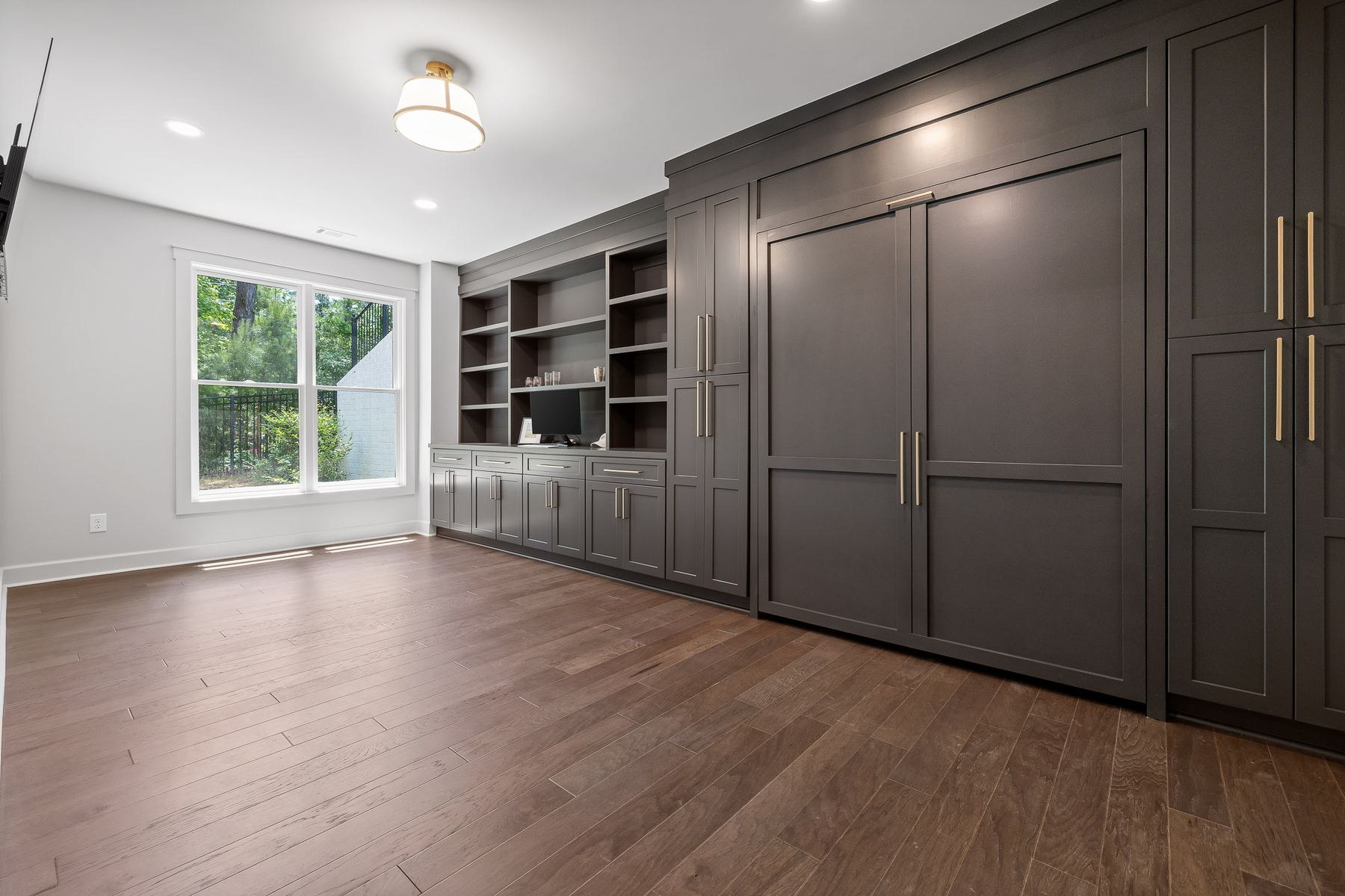 550 Martha Way glass wine cellar with herringbone brick interior